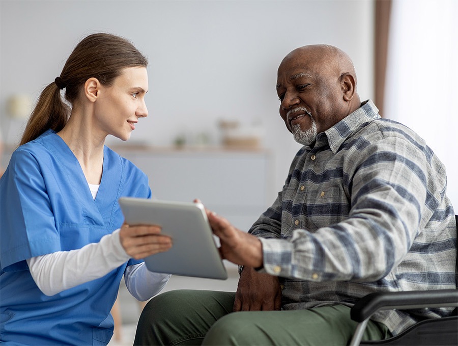 Nurse and Elder with tablet