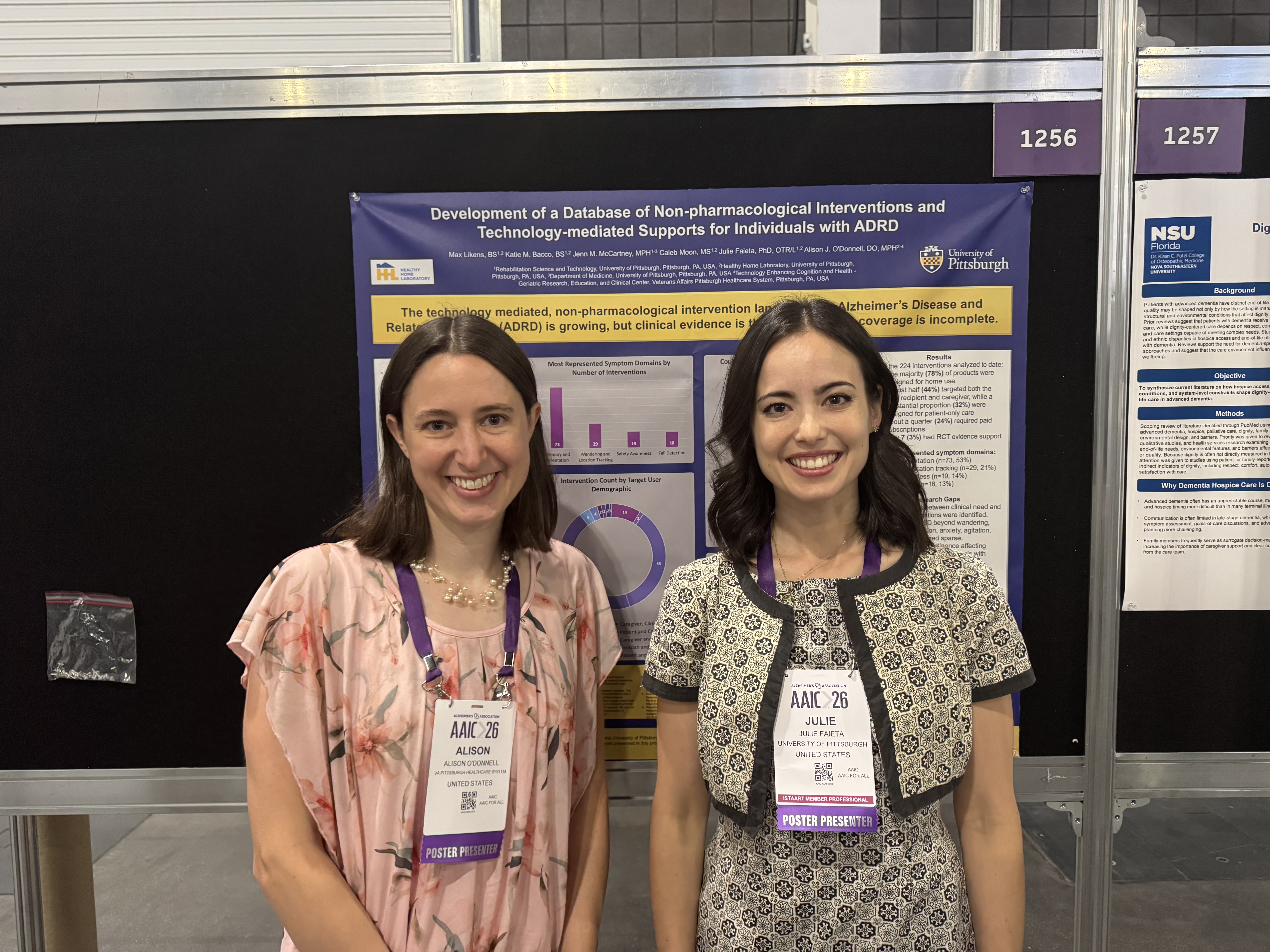 Julie Faeita and Ali O'Donnell presenting their poster in London